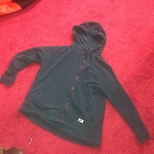 A teal Nike zip up